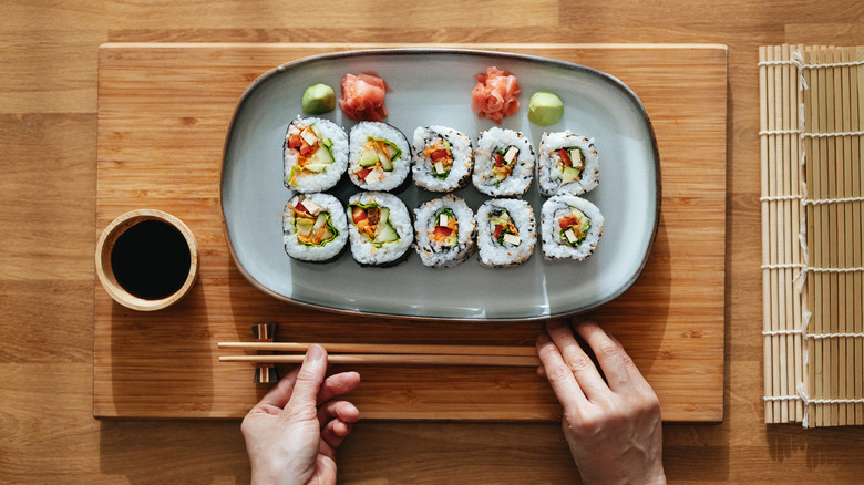 Sushi next to bowl of soy sauce