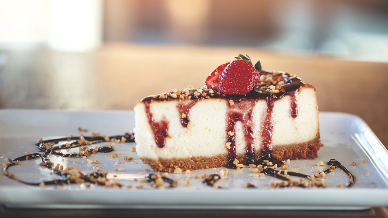 cheesecake with fruit reduction drizzle