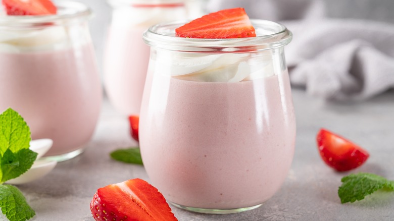 Strawberry mousse in glass jars
