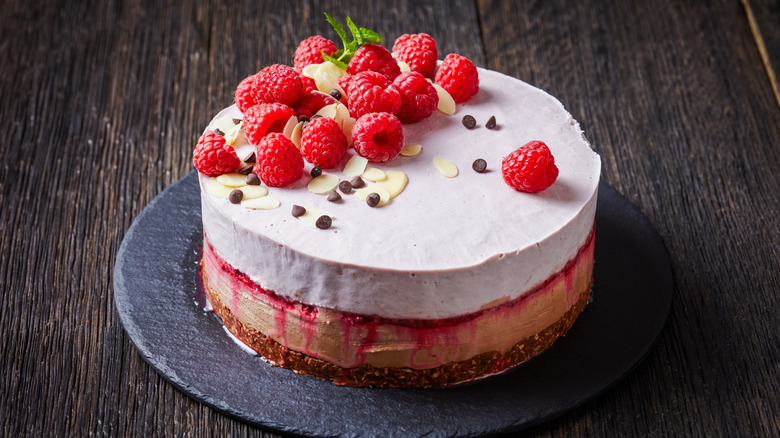 Ice cream cake topped with fresh raspberries