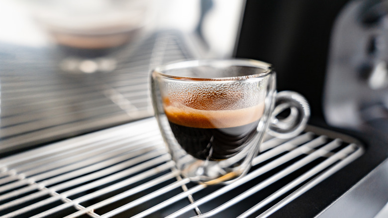 A glass cup of espresso.