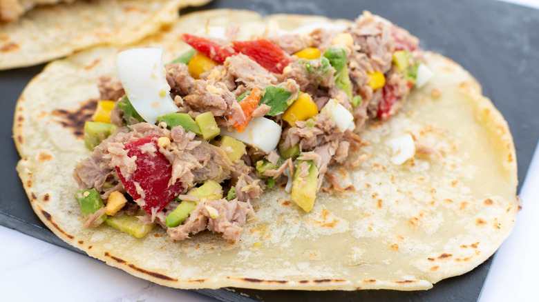 Soft tortilla with canned tuna and vegetables