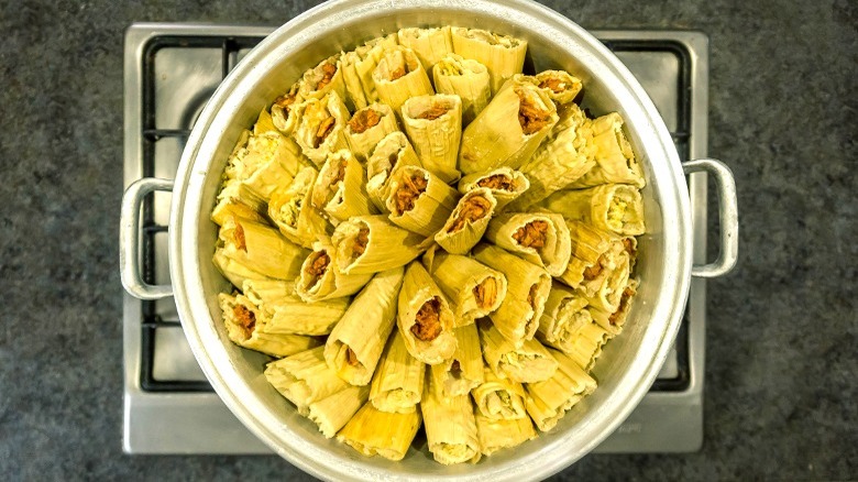 Tamales arranged in large pot