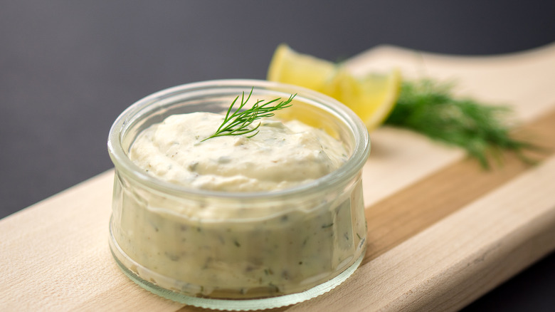 Homemade tartar sauce with fresh dill and lemon