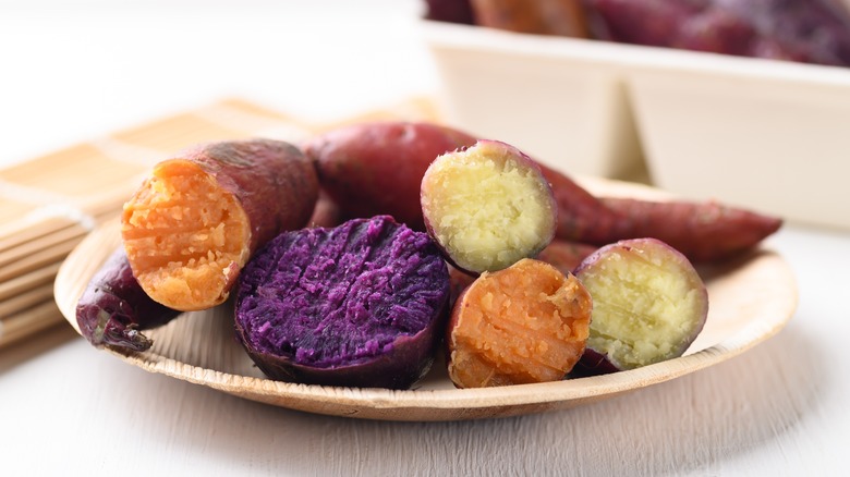 Plate with white, orange and purple roasted sweet potatoes