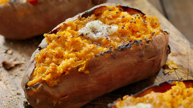 Roasted sweet potato with butter on top