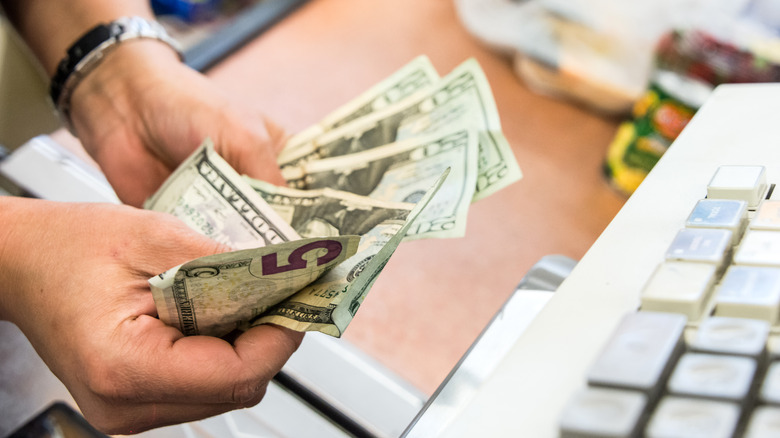 Cashier counting money