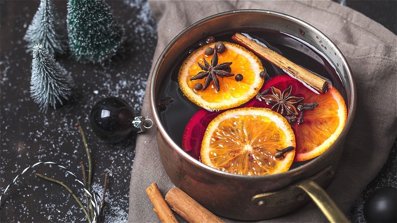 Pot of mulled wine with orange slices