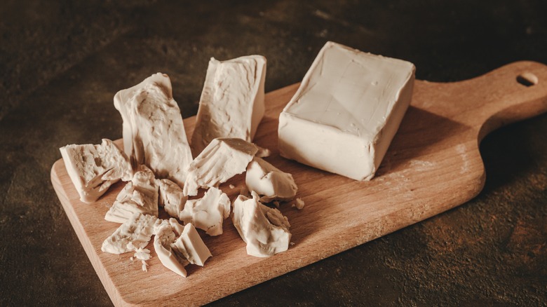 Fresh yeast on a wooden board