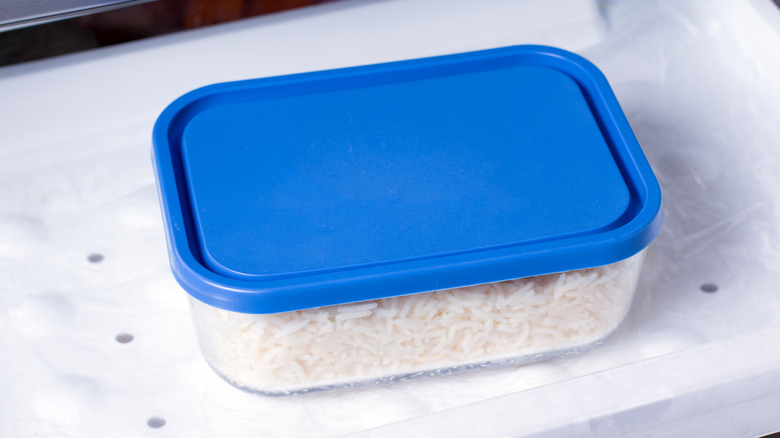 Cooked rice in an airtight container in refrigerator