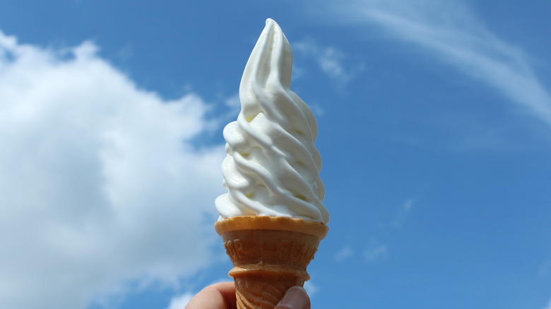 Ice cream cone against blue sky