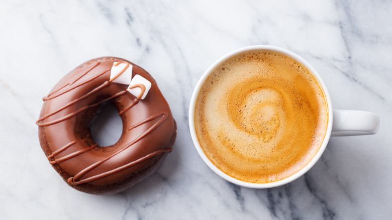 Donut and mug of coffee