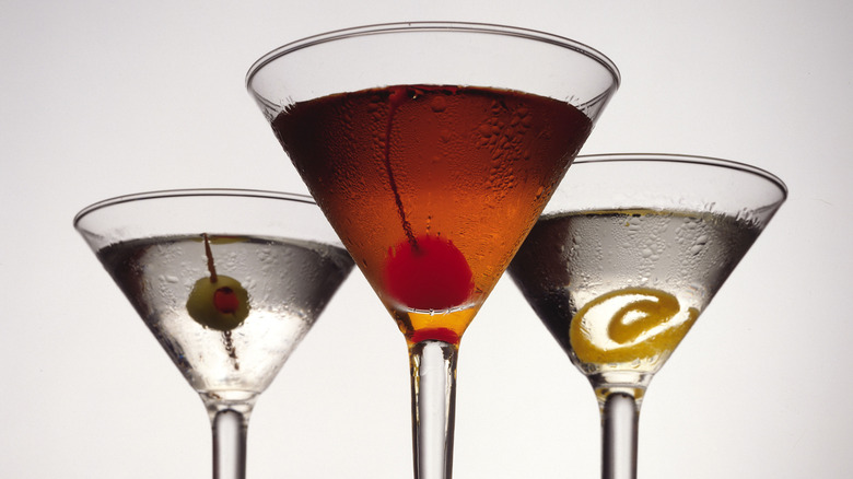 a manhattan and martini cocktails.