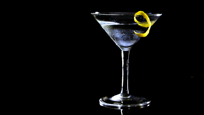 martini cocktail with lemon slice