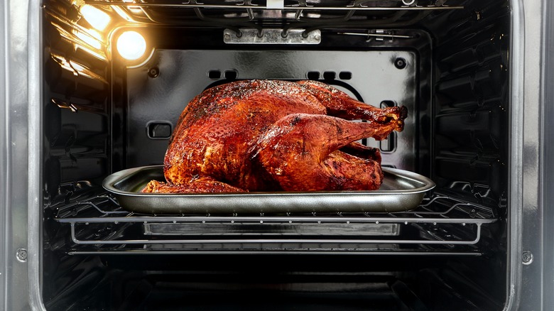 A whole turkey in an oven