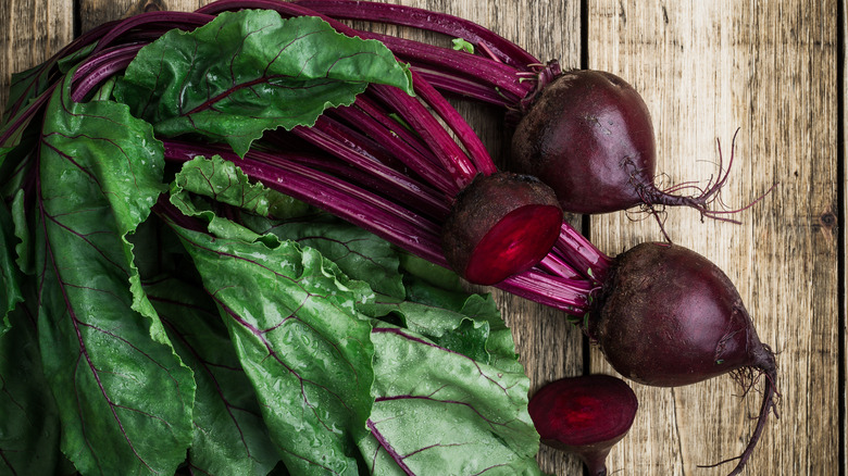 Beets against a wooden board