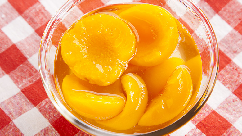 Canned peaches in glass bowl