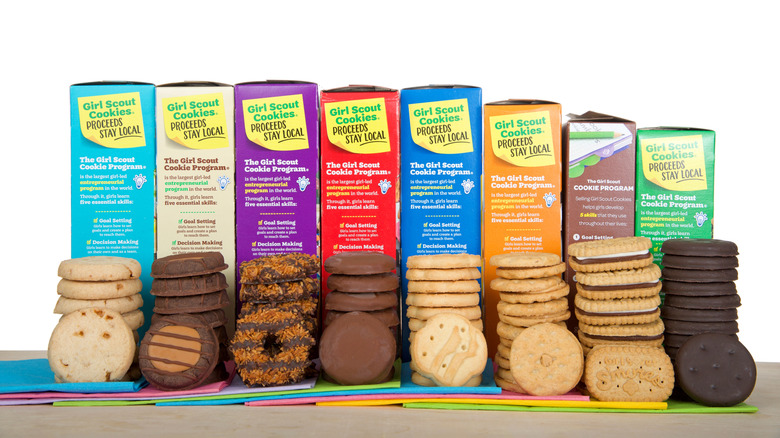 line up of girl scout cookies and their boxes