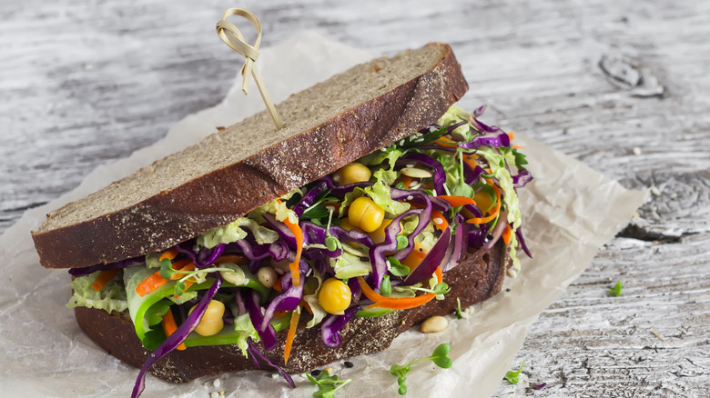 Purple cabbage salad with chickpeas on grain bread