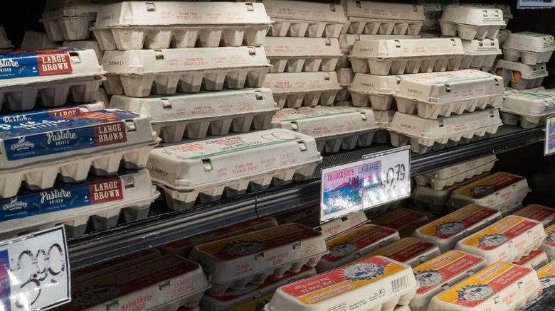 Eggs displayed in a refrigerator case at a Trader Joe's store