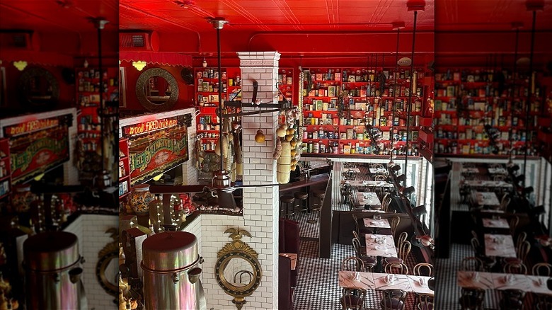 An interior shot of the San Francisco Stinking Rose restaurant with garlic and meat hanging from the walls