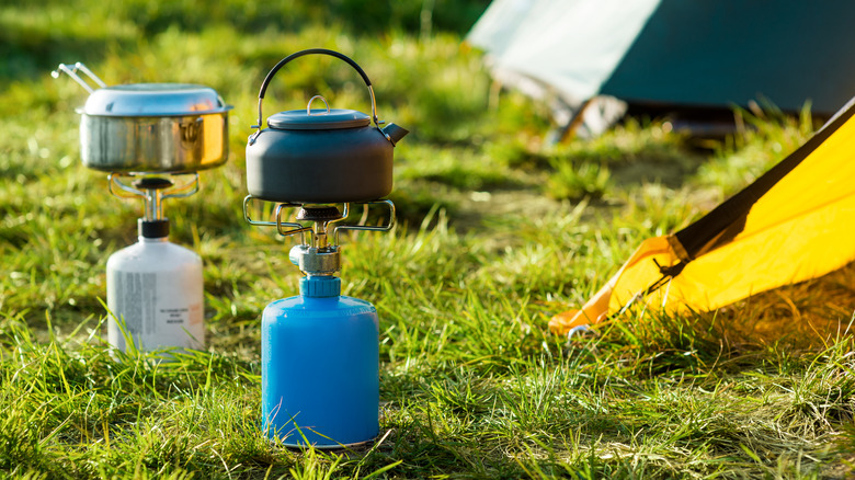 Heating food and boiling water on propane camp stoves