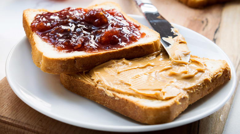 Peanut butter and jelly sandwich with raspberry jam