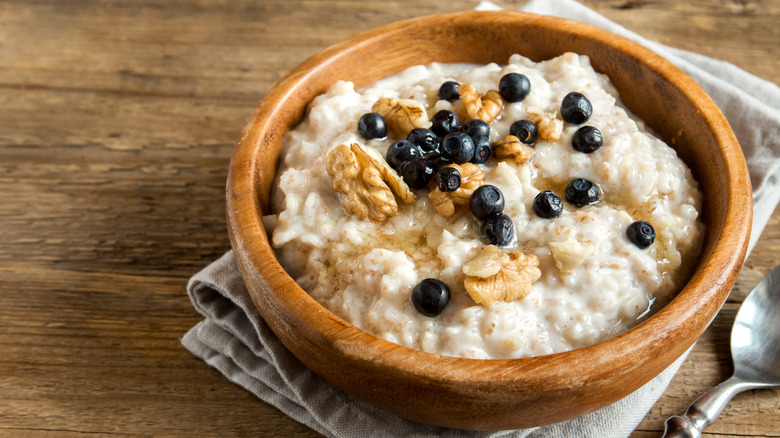 oatmeal topped with blueberries and walnuts