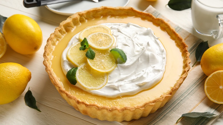 Lemon meringue pie on white table