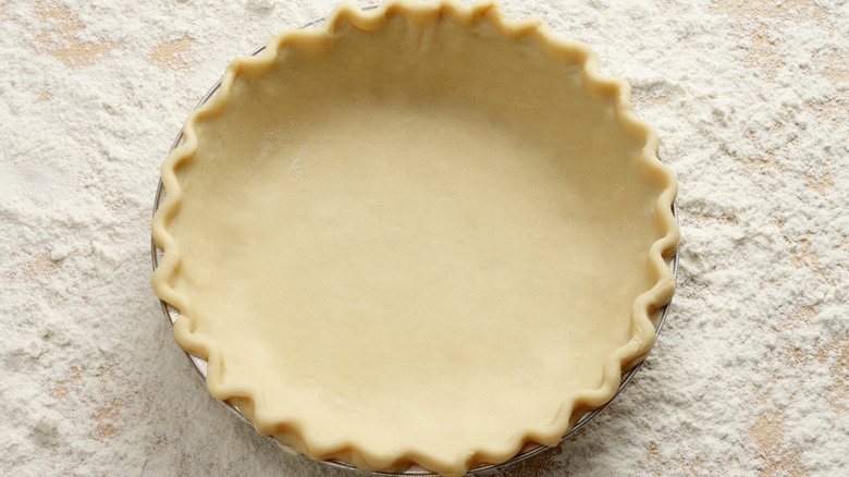 Pie dough in baking pan