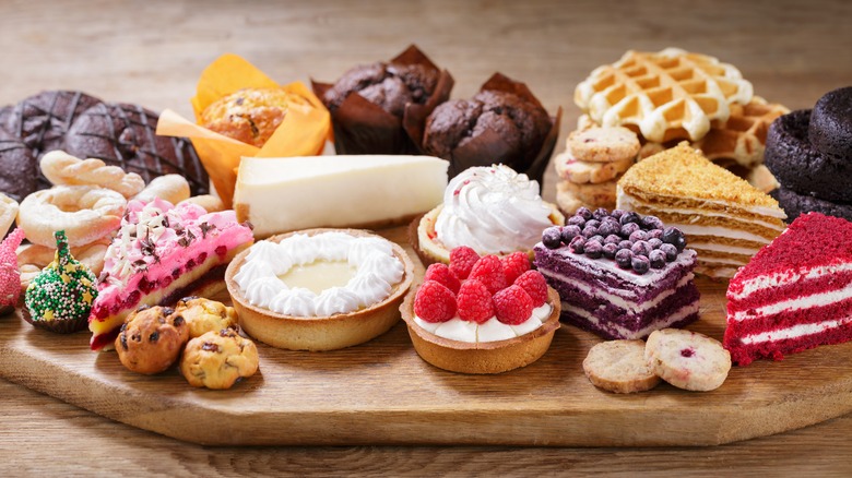 dessert board with colorful treats