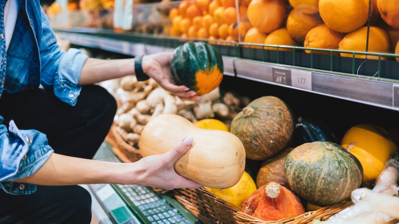 woman shopping for squash