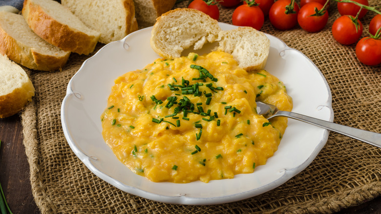 French style scrambled eggs with a baguette