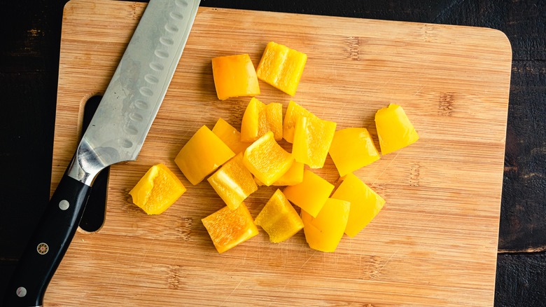 yellow bell pepper on cutting board