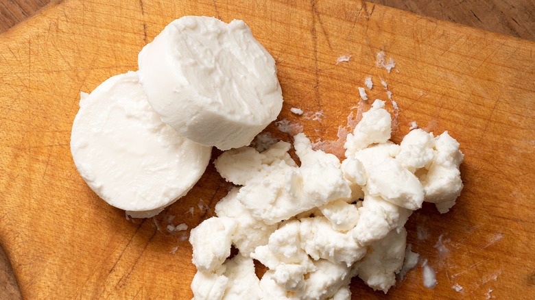 Crumbled discs of goat cheese