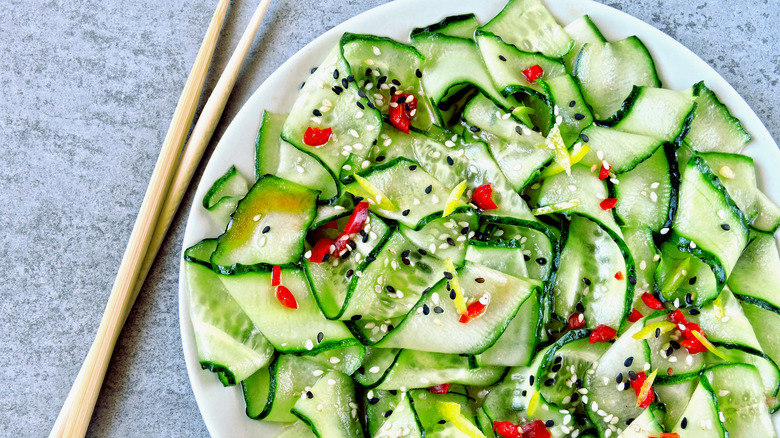 cucumber salad with sesame seeds and chili peppers
