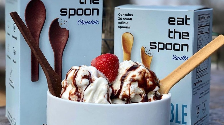 A bowl of ice cream with edible spoons