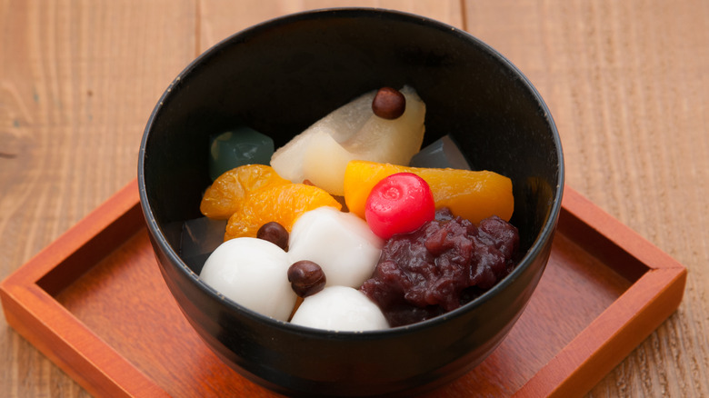 Japanese fruit salad in black bowl