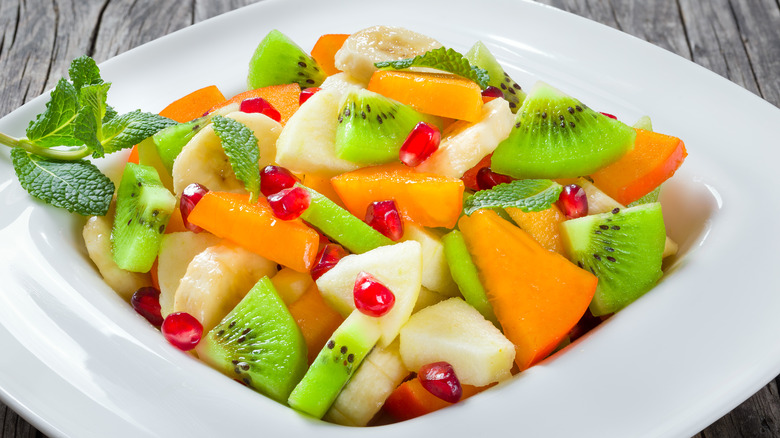 Kiwifruit salad in white serving dish