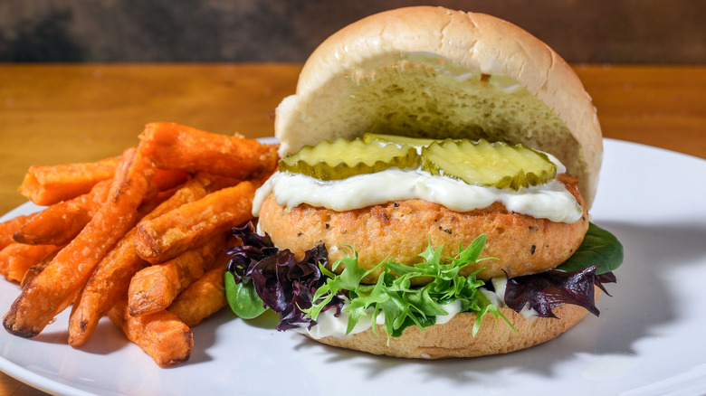 salmon burger with fries