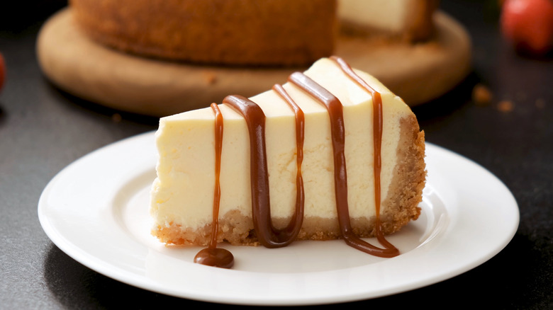 caramel cheesecake slice on white plate