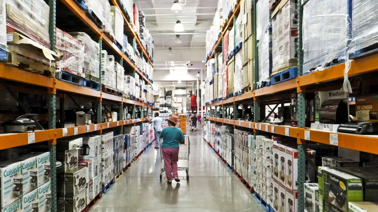 A Costco shopper with a cart