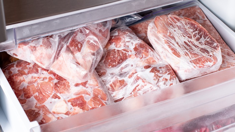 Frozen meat in freezer drawer
