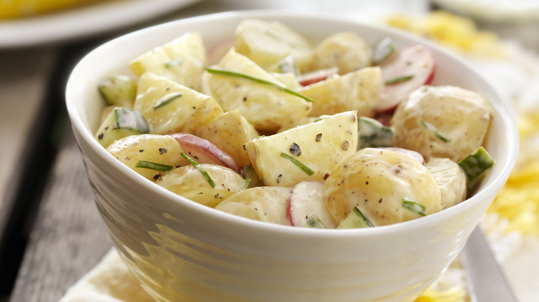 Potato salad dressed with salad cream