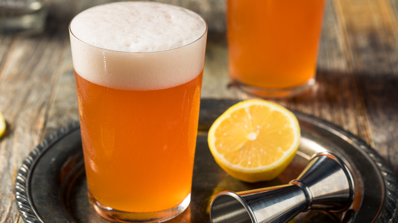 Beer next to a lemon