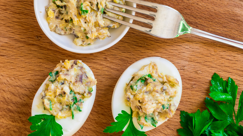 Filling deviled eggs with a fork