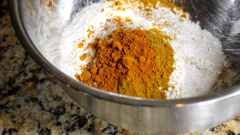 bowl with flour, turmeric, curry powder