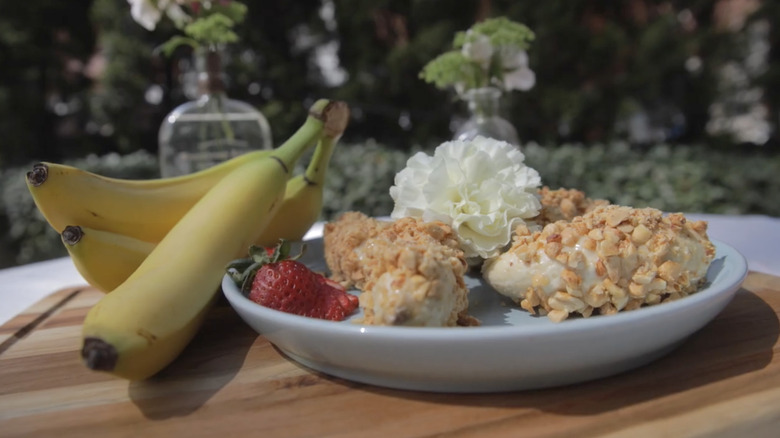 Kentucky style banana croquettes rolled in peanuts