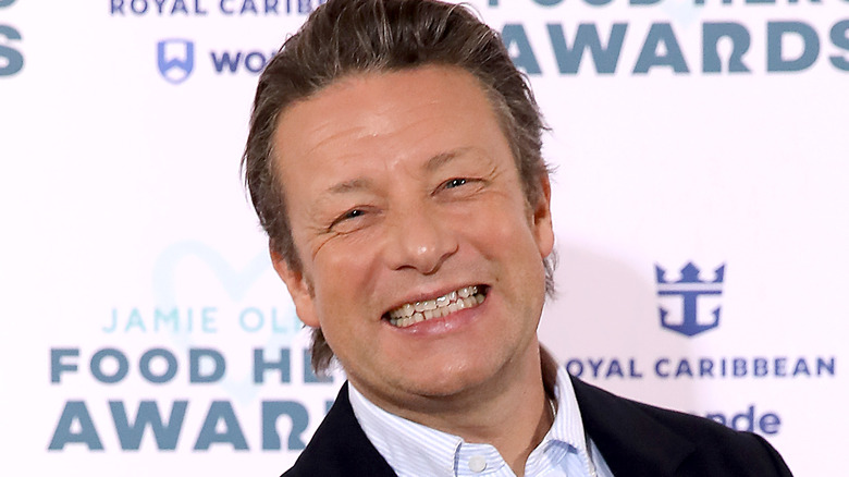 Chef Jamie Oliver smiles at an event