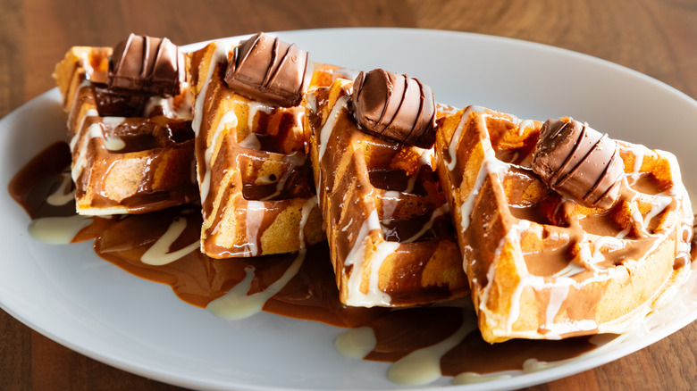 Fluffy waffles triangles with chocolate topping